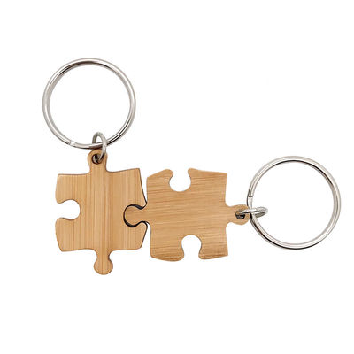 Hölzerne zusammenpassende Puzzlespielschlüsselbambuskette, die UVdrucken graviert