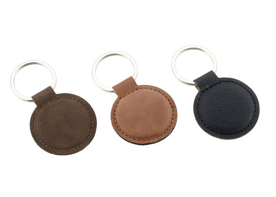 Guter Preis Debossing-Logo PU personifizierte lederne Schlüsselkette ringsum Zink-Legierung Brown Online